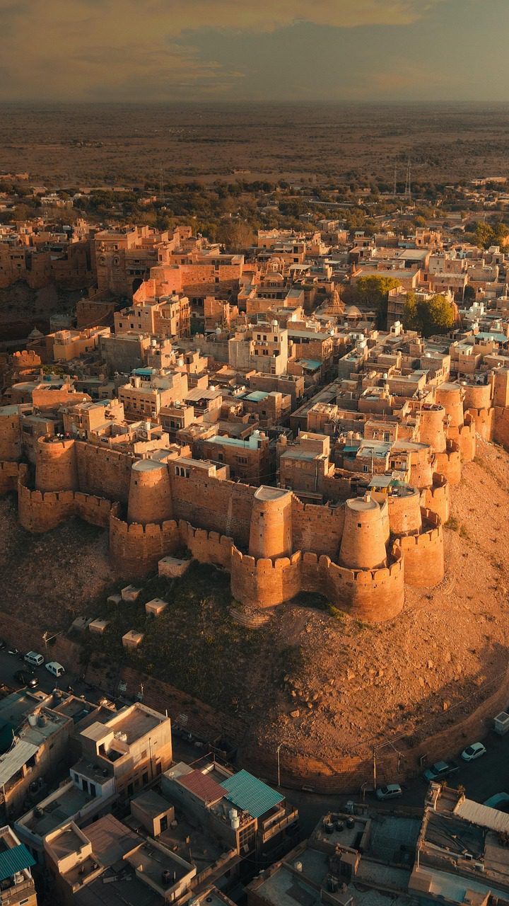 Aerial view of the golden sandstone walls of Jaisalmer Fort in the Thar Desert