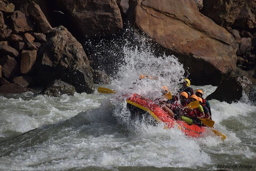 A raft dropping through whitewater on the upper Ganges at Rishikesh
