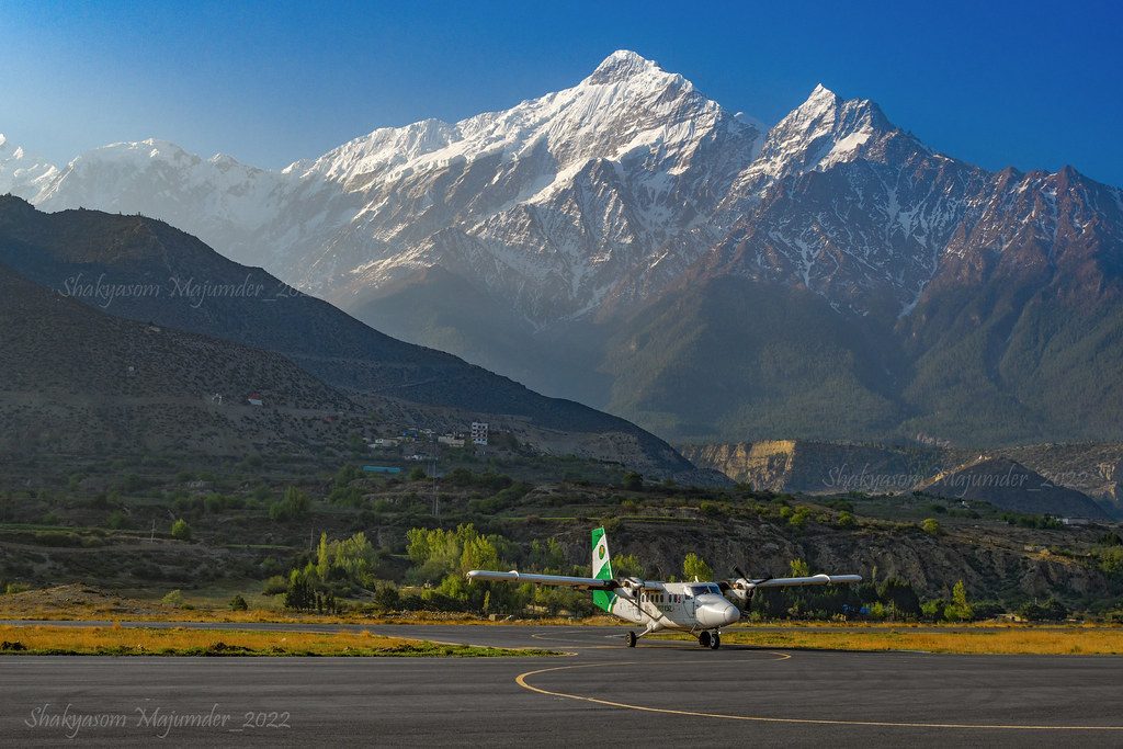A light aircraft at Jomsom airstrip below the Himalaya, Mustang, Nepal