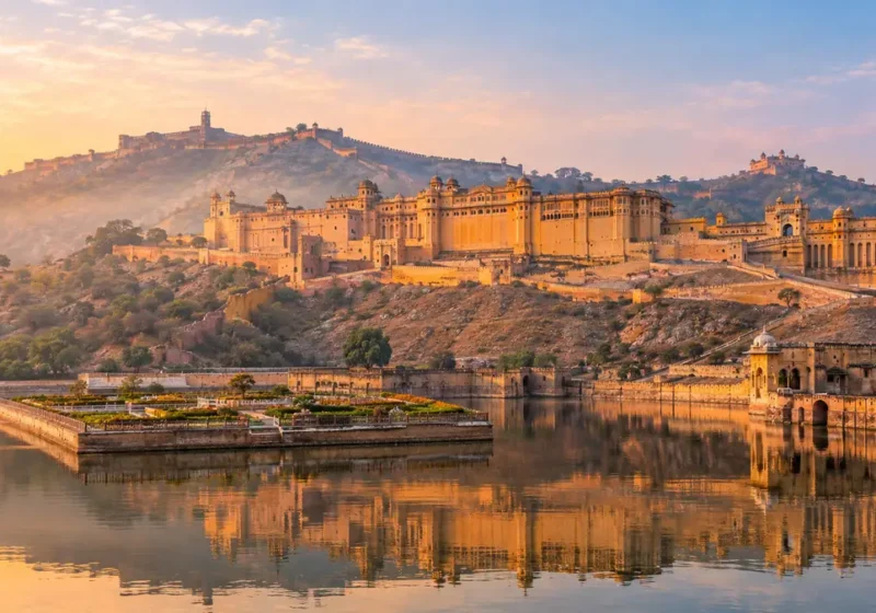 Amber Fort in Jaipur at sunrise reflected in Maota Lake, the top thing to do in Jaipur