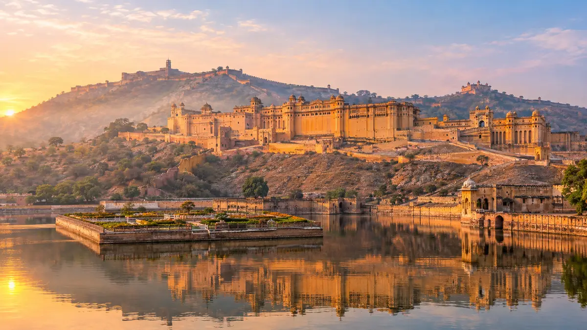 Amber Fort in Jaipur at sunrise reflected in Maota Lake, the top thing to do in Jaipur