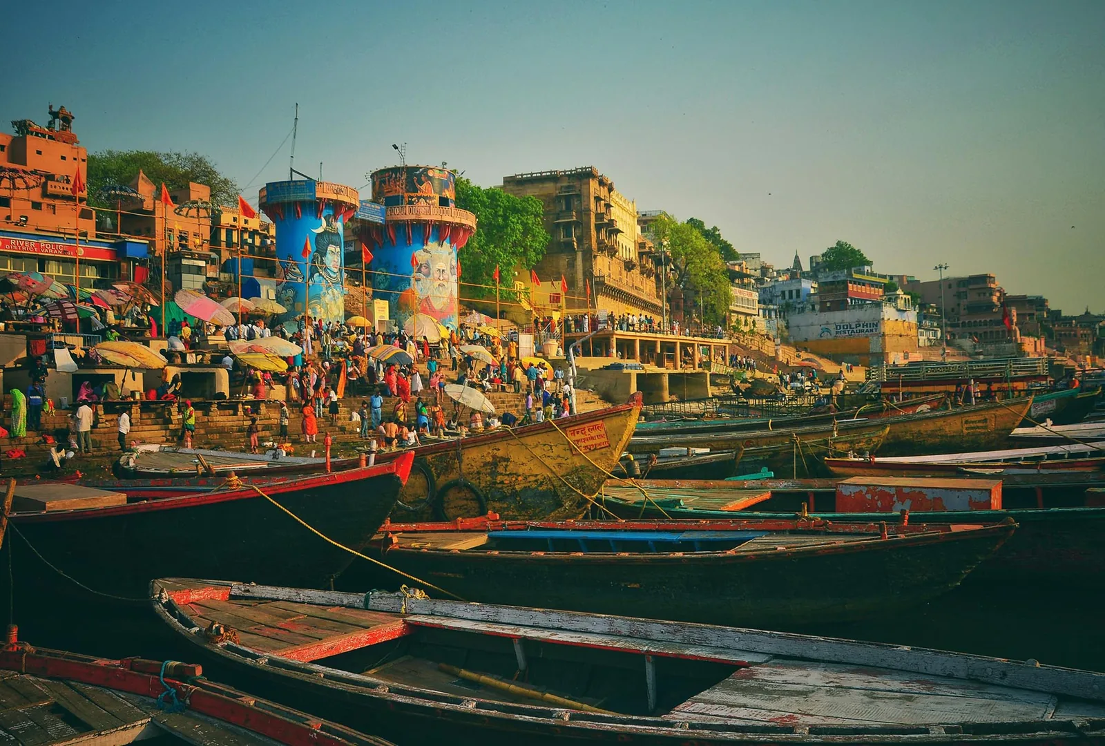 Wooden boats moored below the ghats of Varanasi on the Ganges